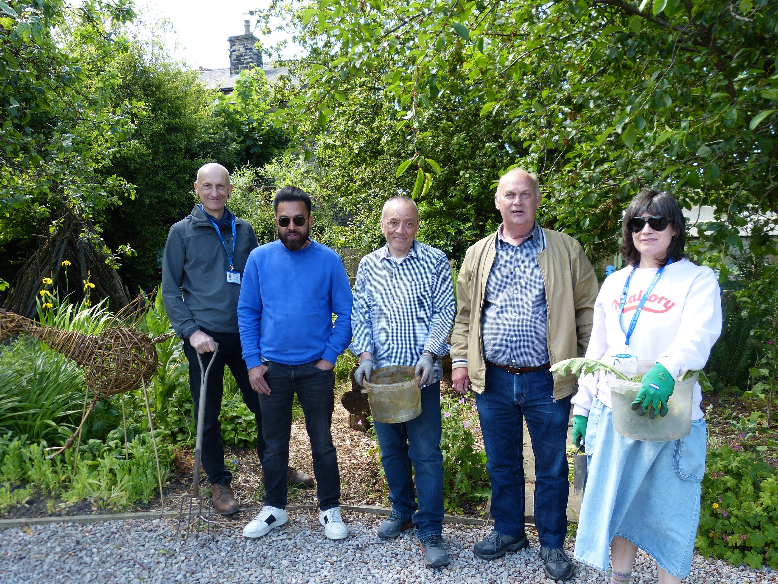 Picture of people at the Carers Week celebration at Carers’ Resource allotment in Bradford 