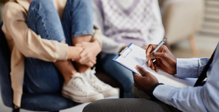 An image of a mental health professional working with young people