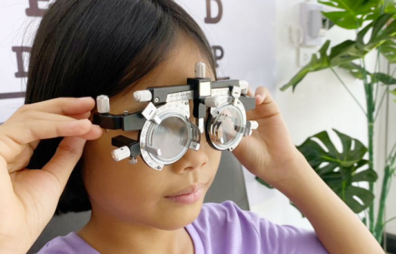Photograph of girl having an eye test