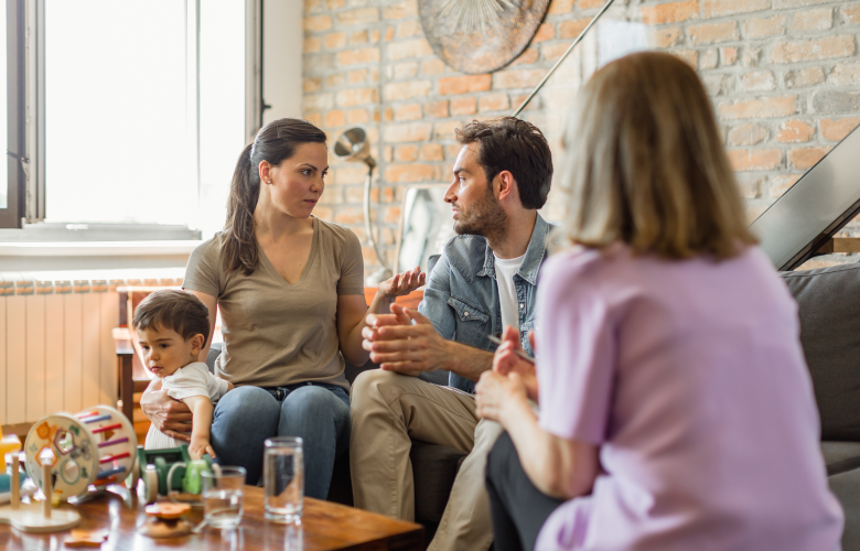 Photograph of a family during a home visit